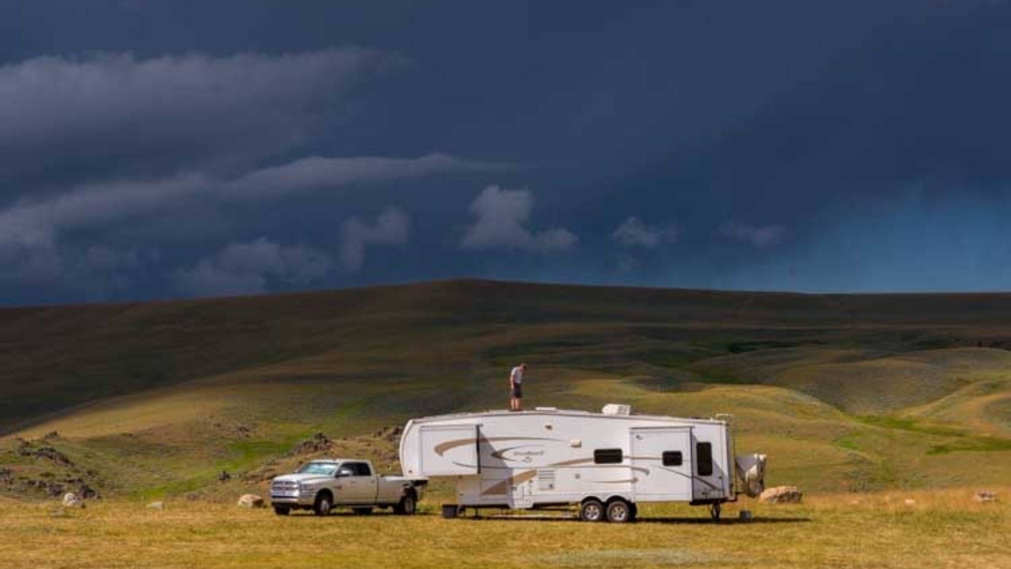 03-751-Checking-RV-roof-vents-on-fifth-wheel-trailer-after-hail-storm-min